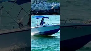 Little boat leaving Haulover Inlet