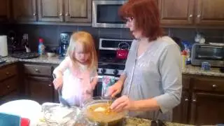 Mimi and Lucy make morning glory muffins.