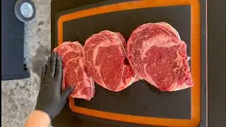 Perfectly Grilled Ribeye Steaks Served With Crispy Potato Wedges