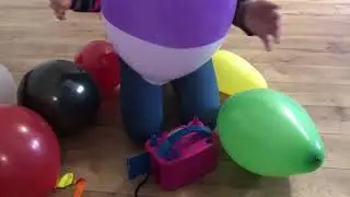 Colorful big balloons pop