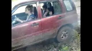 Hot Chick Stuck Spinning Tire Smoking Mudding