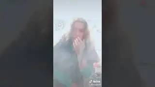Girl smoking cigarettes at home