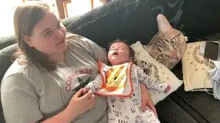 August 2019 - Bumbo sitting, Queen listening, face grabbing and smiles for days!