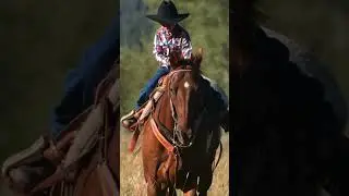 Young cowboy riding horse