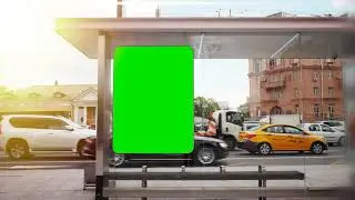 billboard with a green screen on a busy street Chroma key