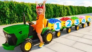 Aprendiendo los números con Oliver en un tractor