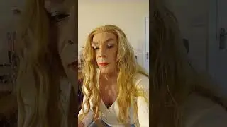 crossdresser tries out new wig