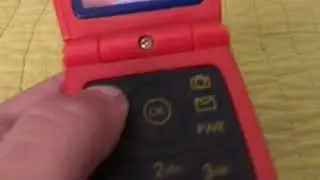 Low battery Mickey Mouse old toy flip phone