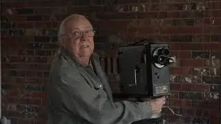 Universal silent era hand cranked movie camera Pathé News