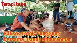 Ustadz Abdurahman's back acupressure at the Social Service event on Melur beach, Galang island