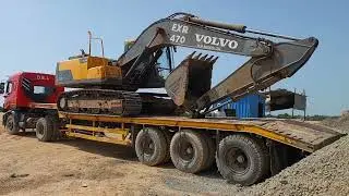 Excavator Upload in Big Truck