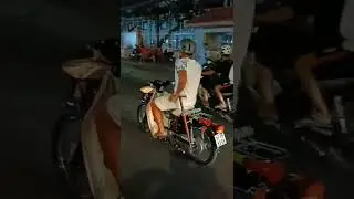 What's this man doing here on Bike ?
