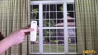 Florida Automated Shade: Somfy Glydea powered curtains activating the touch motion feature