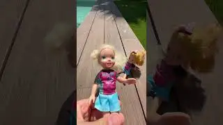 Elsa and Anna toddlers- too cold for the pool