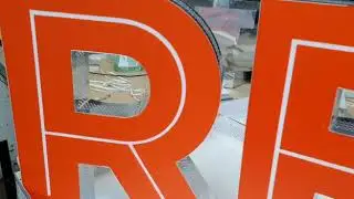 3d Channel Letters, Aluminium perforated Profile with Acrylic covered Orange Vinyl.