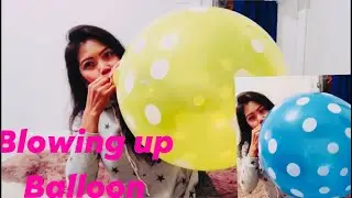 Blowing balloons 🎈