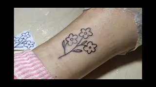 Процесс татуировки/тату цветочек/тату-сеанс/тату ромашка/тату дома