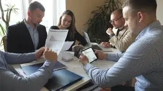 Group of Young Businessmen Sitting at Table in Modern Office  | Videohive Project Templates