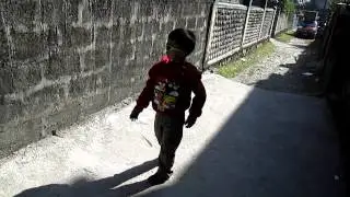 a boy making funny robot move