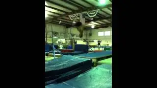 Joel Kovacs - punch front full twisting 1 3/4 salto (Van Ro