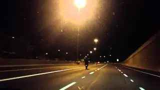 Motorcycles Pop Wheelies on the Freeway