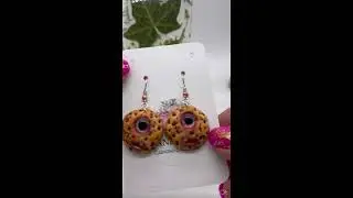 Earrings on a phone stand