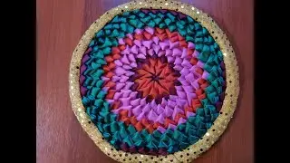Коврик лоскутный из треугольников.