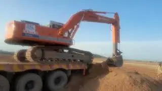 #how to unloading your hitachi excevator from big trailer#watch til end very interesting 🤔