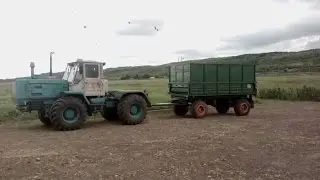 трактор Т150к и столб. планировка территории