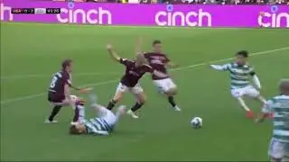 Referee Nick Walsh awards a ridiculous penalty kick to Celtic at Tynecastle.