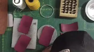 Time lapse of making a leather card holder.