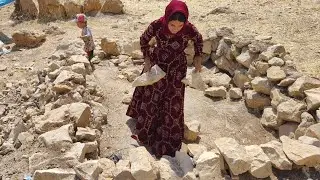 Stone shelter: Setting up a tent to protect from mountain snakes and scorpions