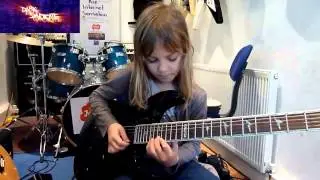 Little girl with insane guitar skills