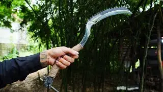 Scrap Metal Forged into a Black Dragon Crescent Knife