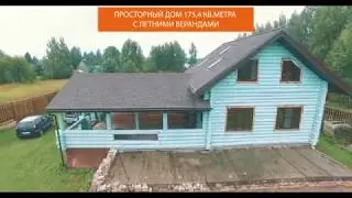 Дом у берега великой реки Волга, в окружении леса.