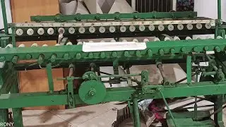 Pirn winding machine for making large package to small package.