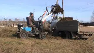 Погрузка навоза самодельным погрузчиком. Холмогорец - 3 с гидроприводом.