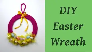Easter wreath made of yarn with Styrofoam eggs and feathers. DIY Easter decorations 🌼🌼🌼