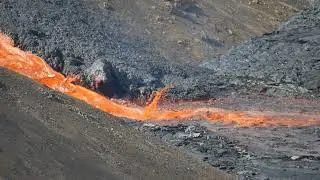 Lava flows fast into Meradali from Fagradalsfjall volcano in Iceland 10 July 2021
