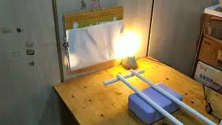 Finding focal length of parabolic mirror (English)