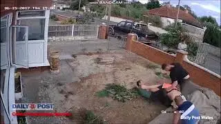 CCTV of Neighbours in Epic Garden Fight with Numerous Punches And Flying Bricks