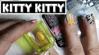 Stamping base color onto your nails and kitty feet
