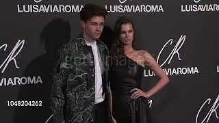 Francisco Lachowski and Jessiann Gravel at the CR Fashion Book x LuisaViaRoma