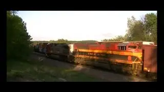 BNSF 4101 W meets ex ATSF 4717 E w/ KCS 4043 and DPU at Railroad Ridge, LOMC- Oregon, Ill 5.21.13