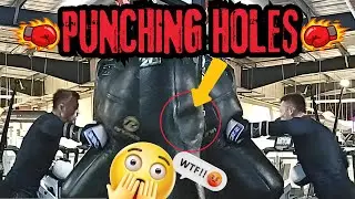 Cruiserweight Punching Hole in Heavy Bag