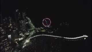 Show de fogos na virada em BC. Antes da queima, a contagem regressiva foi projetada na roda-gigante