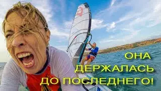 Took girl for a windsurf ride on the waves  The beauty kept to the end  Look with a sound