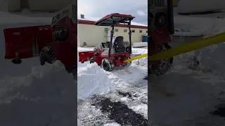 Snowplow Goes Over the Bank and Gets Stuck