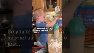 Little boy helps mom make pancakes