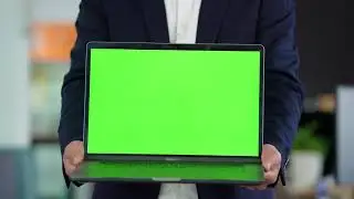 4k business people holding green screen notebook video keying